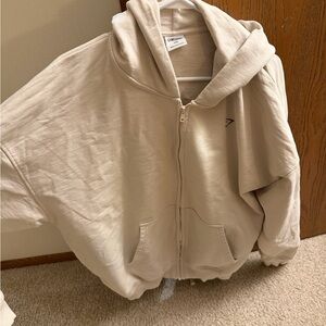 Gymshark Neutral Beige Zip-Up Hoodie with Subtle Logo